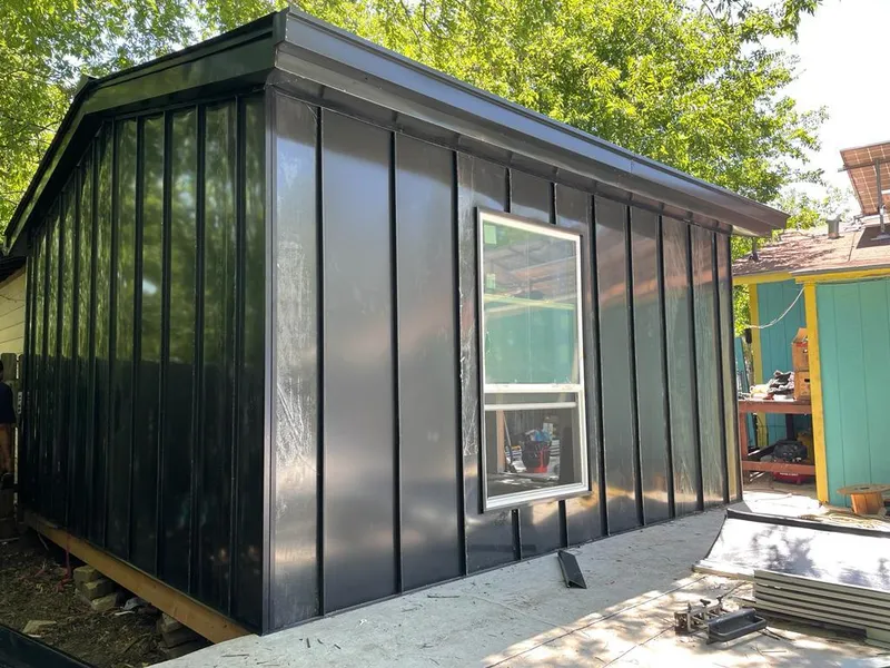 Black standing seam metal wall panels for Metal Roof Installation in Siler City