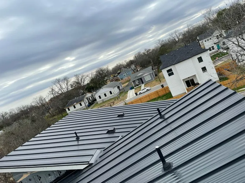 Standing seam metal roof panels with vents for Skylight Repair in Siler City